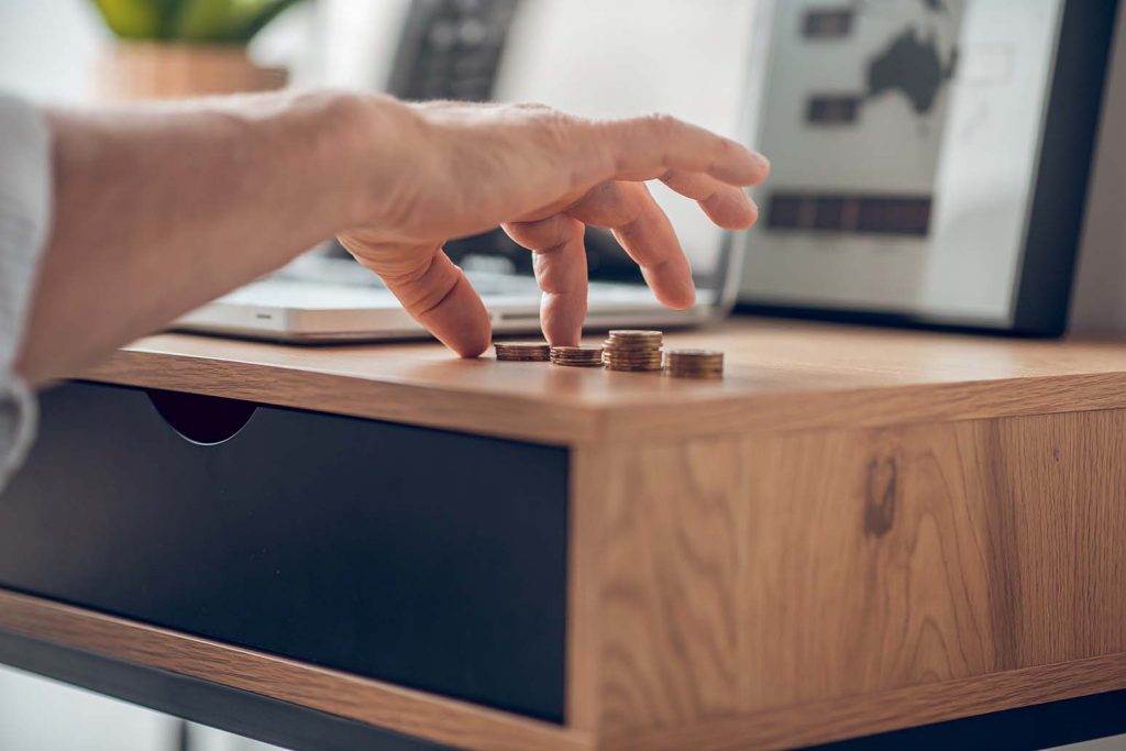 A picture of someone counting money