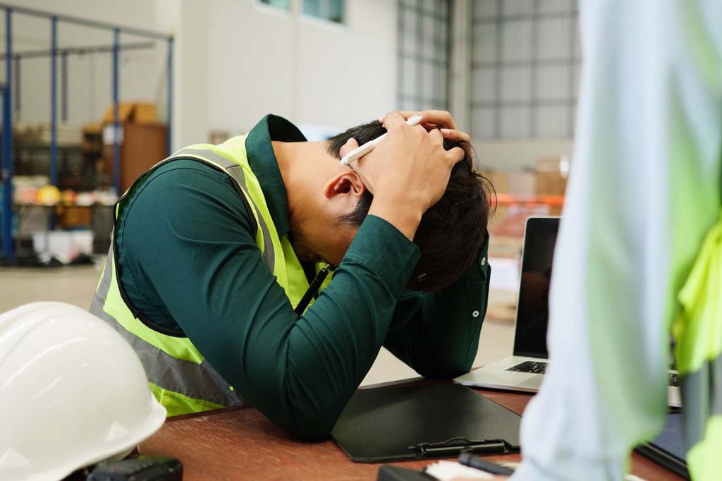 Image of worker feeling sad